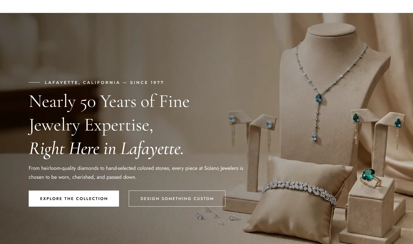 Shop homepage hero reading Nearly 50 Years of Fine Jewelry Expertise, Right Here in Lafayette, with buttons to explore the collection or design something custom